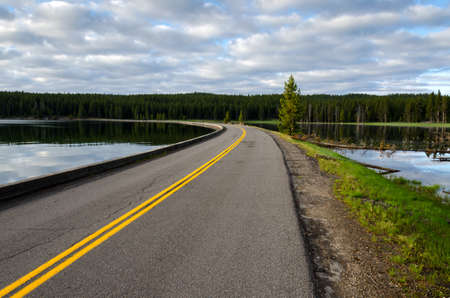 sunrise in Yellowstone lake in Yellowstone National Park in Wyomingの写真素材
