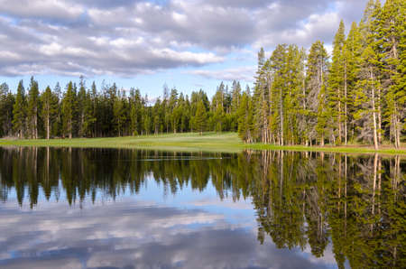 sunrise on Yellowstone lake in Yellowstone National Park in Wyomingの写真素材