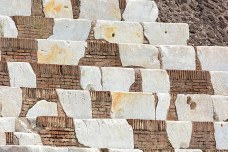 views and details of the colosseum monument in Rome in Italyの写真素材