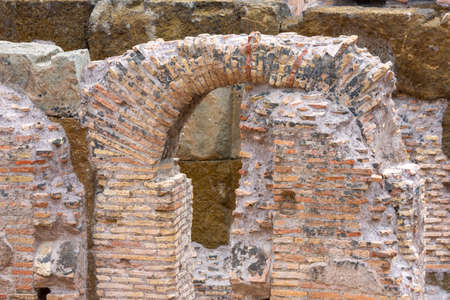 views and details of the colosseum monument in Rome in Italyの写真素材