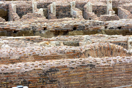 views and details of the colosseum monument in Rome in Italyの写真素材