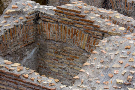 views and details of the colosseum monument in Rome in Italyの写真素材