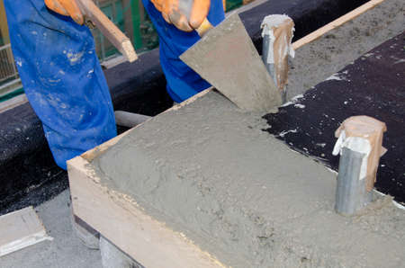 laying of waterproofing sheathing and insulation during the renovation of a roof in Italyの写真素材