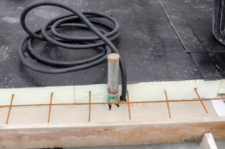 laying of waterproofing sheathing and insulation during the renovation of a roof in Italyの写真素材