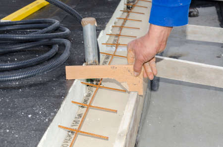 laying of waterproofing sheathing and insulation during the renovation of a roof in Italyの写真素材