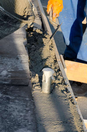 laying of waterproofing sheathing and insulation during the renovation of a roof in Italyの写真素材