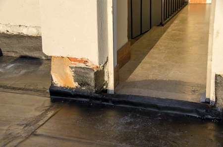 laying of waterproofing sheathing and insulation during the renovation of a roof in Italyの写真素材