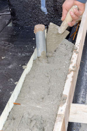laying of waterproofing sheathing and insulation during the renovation of a roof in Italyの写真素材