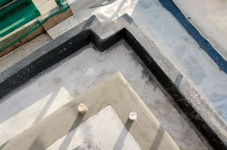 laying of waterproofing sheathing and insulation during the renovation of a roof in Italyの写真素材