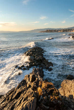 storm surge at sunset in Genoa in Liguria, Italyの写真素材