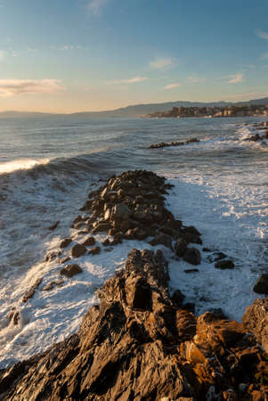 storm surge at sunset in Genoa in Liguria, Italyの写真素材