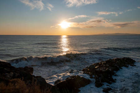 storm surge at sunset in Genoa in Liguria, Italyの写真素材