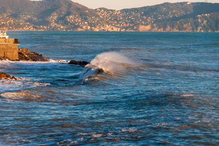 storm surge at sunset in Genoa in Liguria, Italyの写真素材