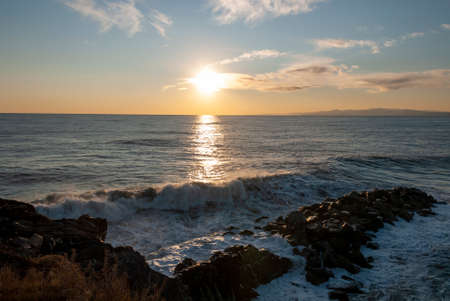 storm surge at sunset in Genoa in Liguria, Italyの写真素材