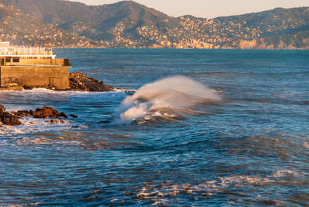 storm surge at sunset in Genoa in Liguria, Italyの写真素材