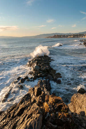 storm surge at sunset in Genoa in Liguria, Italyの写真素材
