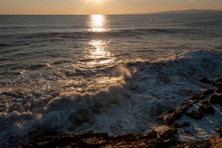 storm surge at sunset in Genoa in Liguria, Italyの写真素材