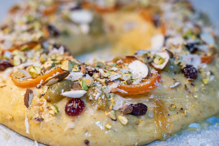 roscon de reyes traditional Spanish dessert cake made at Christmas with almond cream and candied fruitの写真素材