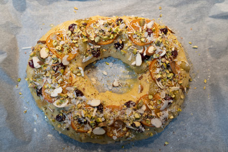 roscon de reyes traditional Spanish dessert cake made at Christmas with almond cream and candied fruitの写真素材