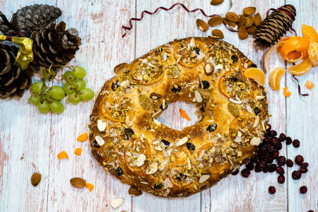 roscon de reyes traditional Spanish dessert cake made at Christmas with almond cream and candied fruitの写真素材