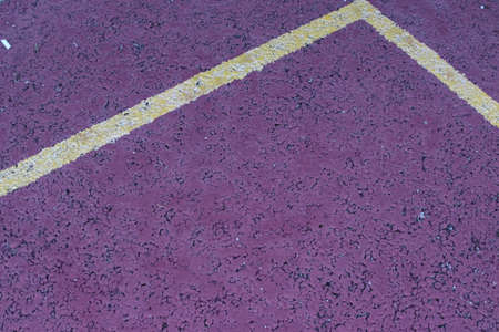 Yellow line on a red backgroundの写真素材
