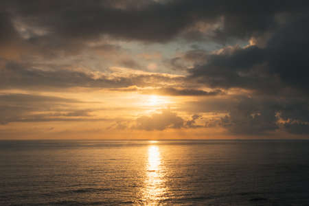 Atlantic ocean landscape with clouds and bright sun.の写真素材