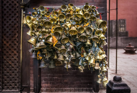 golden bells in a hindust temple in khatmandu. Nepal.の写真素材