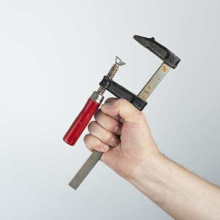 Clamp in handの写真素材