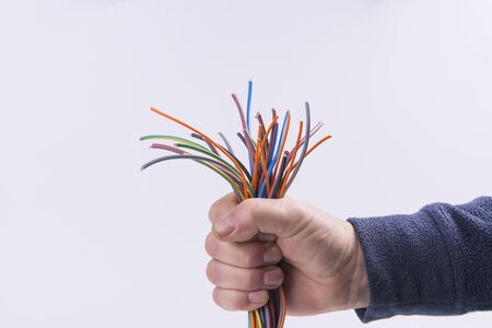 bundle of electric wires in hand