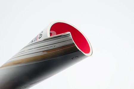 rolled-up magazine