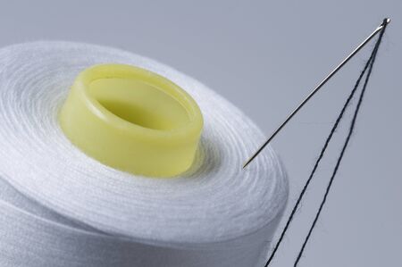 spool of white threadの写真素材