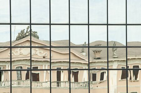 reflections: old and newの写真素材