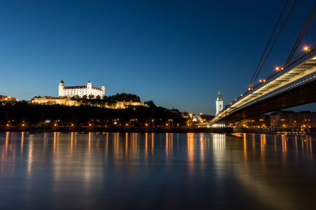 A panoramic view of the Danube river and the city in Bratislava by nightのeditorial素材