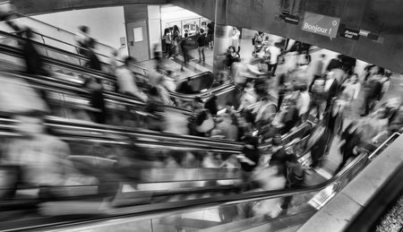 People on the escalators in a metro station in Parisのeditorial素材
