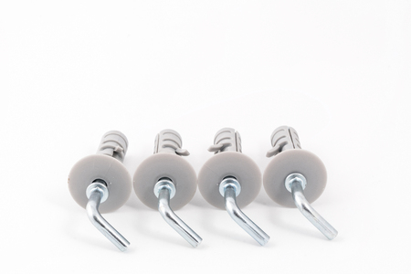 a series of metal clips with plastic plugs on a white background