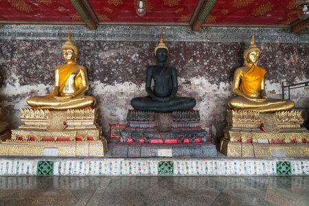 Buddha statues in Wat Suthat temple in Bangkokのeditorial素材
