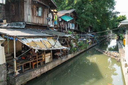 Old typical wooden houses on the Khong Saen Saeb canal in Bangkok