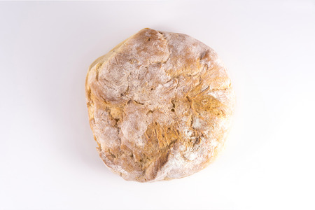 a loaf of bread on a white surfaceの写真素材