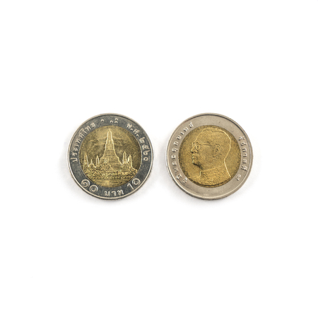Thai 10-baht coin on a white surfaceの写真素材