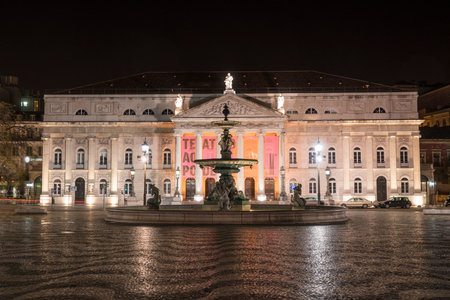 A view of the fountain in the center of Rossio square in Lisbon, Portugalのeditorial素材