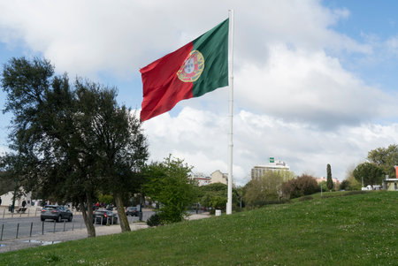 The portuguese flag waving in Parque Edoardo VII in Lisbon, Portugalのeditorial素材