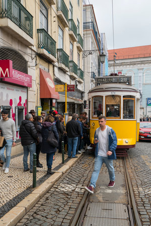 The tram n.28 in Luis de Camoes Square in Lisbon, Portugalのeditorial素材