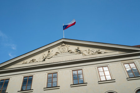 The Czech flag waving over a palace in Prague, Czech Republicのeditorial素材