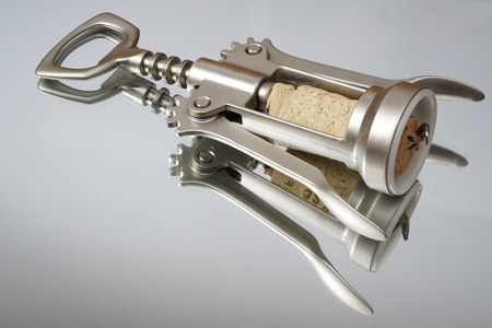 A corkscrew  on a mirrorの写真素材