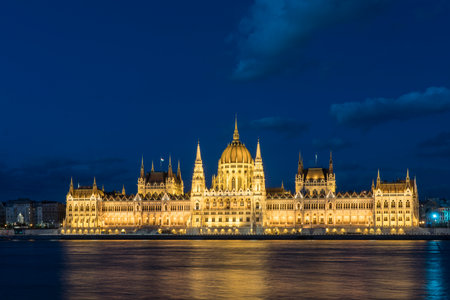 The palace of Parliament in front of Danube river at dusk in Budapest, Hungaryのeditorial素材