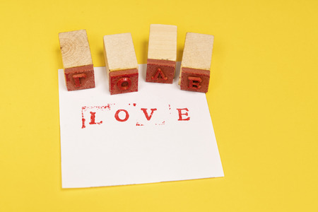 write the word Love with the stamps
