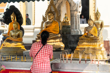 A prayer in a temple in Bangkokのeditorial素材