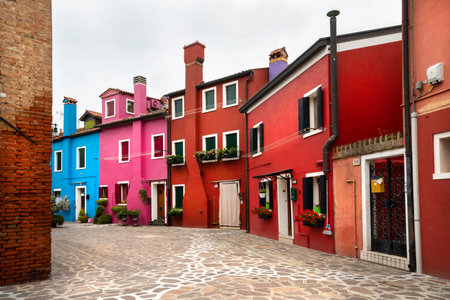 view of the brightly colored houses in Burano istand, Venice, Italyのeditorial素材