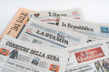 A view of some italian newspapers on the tableのeditorial素材