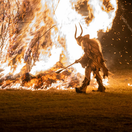 The Krampus masks in an exhibition in the night in Tarvisio, Italyのeditorial素材